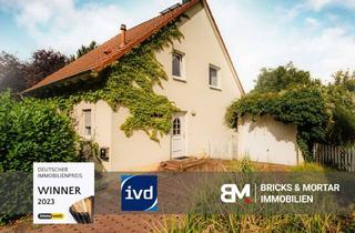 Einfamilienhaus kaufen in 06120 Heide Süd, Familienfreundliches Einfamilienhaus mit Kamin, großem Garten & Garage