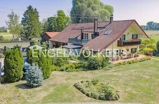 Haus kaufen in 85757 Karlsfeld, Beeindruckendes Refugium auf rund 5.800 m² Grundstück
