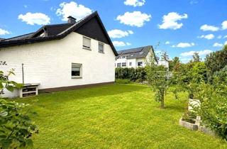Einfamilienhaus kaufen in 52428 Jülich, Freistehendes Einfamilienhaus auf großzügigem Grundstück mit Wintergarten und drei Garagen in Jülich
