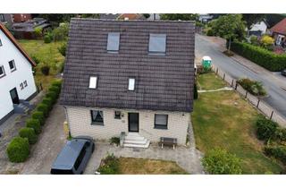 Haus kaufen in 49143 Bissendorf, Großzügiges Zweifamilienhaus mit Wintergarten, Vollkeller, Nebengebäude und Grundstück in Bissendorf