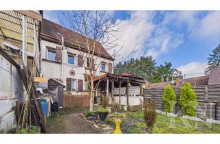 Haus kaufen in 66583 Spiesen-Elversberg, Sanierungsobjekt mit Garten und Carport in zentraler Lage von Spiesen-Elversberg