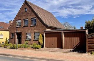Haus kaufen in 47495 Rheinberg, Rheinberg-Budberg: Wohnen wie im Bungalow - aber mit zusätzlicher Mieteinnahme!