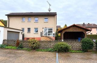 Mehrfamilienhaus kaufen in 97797 Wartmannsroth, Mehrfamilienhaus mit 3 Wohnungen, Garten, Doppelcarport und Garage!