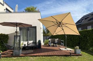 Wohnung kaufen in 50226 Frechen, 4-Zimmer-Gartenwohnung im Haus-im-Haus-Konzept