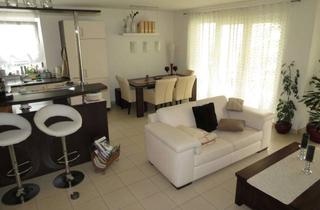 Wohnung mieten in Zwingerstraße 17a, 63477 Maintal, 3 Zimmer Wohnung mit großer Terrasse und Garten sowie zwei Stellplätzen in Tiefgarage