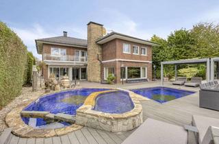 Einfamilienhaus kaufen in 59269 Beckum, Exklusives Designer-Einfamilienhaus mit Poollandschaft, Sauna & Outdoorküche