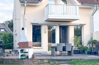 Einfamilienhaus kaufen in 63584 Gründau, Familientraum mit Garten - Gepflegtes Einfamilienhaus in Top-Lage