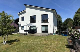 Haus kaufen in 24620 Bönebüttel, Modernes Zweiparteienhaus mit Carport und Garten in ansprechender Lage