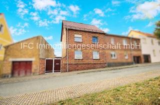 Doppelhaushälfte kaufen in 06766 Bobbau, Doppelhaushälfte mit überdachter Terrasse und zwei Garagen in Bitterfeld-Wolfen OT Bobbau