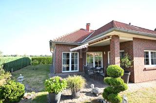 Haus kaufen in 30989 Gehrden, Komfortables Wohnen auf einer Ebene in attraktiver Feldrandlage