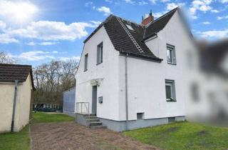 Einfamilienhaus kaufen in 46240 Eigen, Modernisiertes Einfamilienhaus mit 3,5 Zimmern, Garten & Kamin in Bottrop