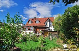 Haus kaufen in 63863 Eschau, BERK Immobilien - Großzügiges Zuhause mit idyllischem Garten und lichtdurchflutetem Wintergarten