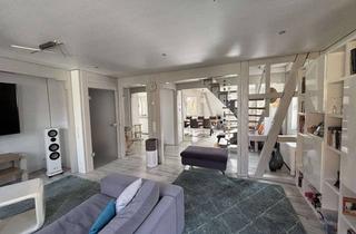 Wohnung kaufen in 71272 Renningen, Moderne Wohnung mit Gartenanteil und einer separaten Werkstatt