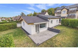 Haus kaufen in 65388 Schlangenbad, Wohnen auf einer Ebene – gepflegter Bungalow mit Garten, Kamin und viel Platz zum Leben