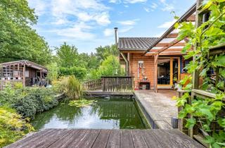 Haus kaufen in 27299 Langwedel, Bungalow mit großzügigem Grundstück, Pool und Teichanlage
