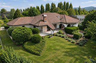 Villa kaufen in 79423 Heitersheim, Großzügige Villa mit Bungalow-Charakter auf parkähnlichem Grundstück in Heitersheim
