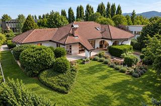 Villa kaufen in 79423 Heitersheim, Großzügige Villa mit Bungalow-Charakter auf parkähnlichem Grundstück in Heitersheim
