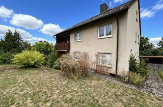 Mehrfamilienhaus kaufen in 97797 Wartmannsroth, Mehrfamilienhaus mit 3 Wohnungen, Garten, Doppelcarport und Garage!