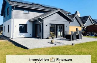 Einfamilienhaus kaufen in 23714 Malente, Großzügiges Architektenhaus mit Carport, Wärmepumpe und PV-Anlage in ruhiger Lange!