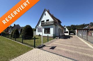 Haus kaufen in 27313 Dörverden, Dörverden: Charmantes Siedlungshaus mit Carport und Nebengebäude auf großem Gartengrundstück