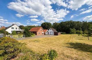 Einfamilienhaus kaufen in 27313 Dörverden, Dörverden-Westen: Gemütliches Einfamilienhaus mit Anbauten, Kaminofen und unterkellertem Garagenhaus