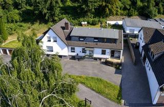Mehrfamilienhaus kaufen in 42655 Solingen, Einzigartiges Immobilienensemble im Herzen von Solingen – 5 Garagen und ein Traumgrundstück