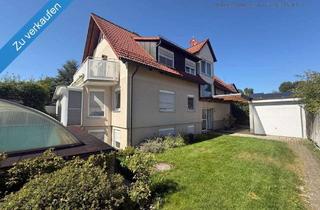 Mehrfamilienhaus kaufen in 91058 Tennenlohe, Attraktives Mehrfamilienhaus mit 4 Wohneinheiten, PV-Anlage und Garagen