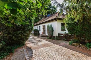 Haus kaufen in 21365 Adendorf, Doppelhaus im Bungalowstil – großzügiges Grundstück direkt am Naturschutzgebiet