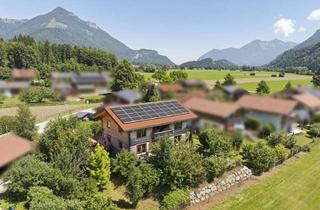 Haus kaufen in 83259 Schleching, Alpines Wohngefühl in Schleching: Chiemgauer Holzhaus mit KfW-40 & Bergblick