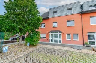 Wohnung kaufen in Andreas-Bräm-Straße 10, 47506 Neukirchen-Vluyn, Wohnen mit Hauscharakter: Modernisierte Erdgeschosswohnung mit Garten am Ortskern von Neukirchen