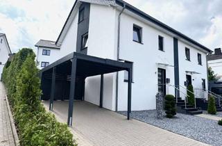 Doppelhaushälfte kaufen in 33699 Hillegossen, Familienglück auf drei Ebenen – moderne Doppelhaushälfte mit viel Raum in Bielefeld