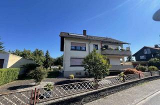 Haus kaufen in 76479 Steinmauern, Zweifamilienhaus mit einer vermieteten Wohnung und Garten - nach WEG geteilt