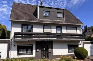 Haus kaufen in 40882 Ratingen, Viel Raum für Familie und Ideen: Zweifamilienhaus mit großem Garten in Ratingen-Homberg