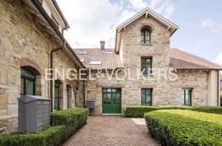 Wohnung kaufen in 44227 Schnee, Charmante Dachgeschosswohnung mit Balkon und funktionaler Raumaufteilung