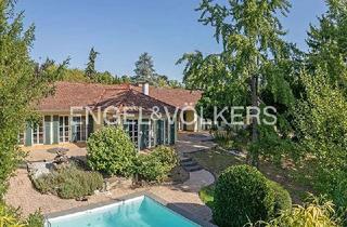 Haus kaufen in 65812 Bad Soden, Bungalow mit Traumgrundstück - Komfortables Wohnen auf einer Ebene