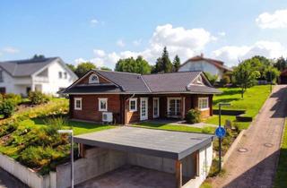 Haus kaufen in 66500 Hornbach, Modernes Wohnen auf einer Ebene – gepflegter Holz-Bungalow mit viel Platz und Wohlfühlcharakter