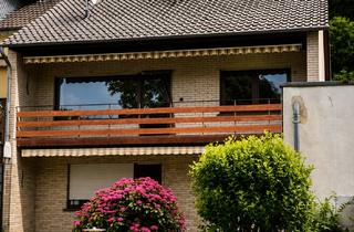 Einfamilienhaus kaufen in 53557 Bad Hönningen, Ariendorf: Großzügiges Einfamilienhaus mit 2 Wohnbereichen und großem Garten