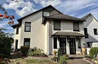 Haus kaufen in 63322 Rödermark, Zwei Wohnungen. Viele Möglichkeiten. Stilvolles Zweifamilienhaus mit Zukunft in Ober-Roden