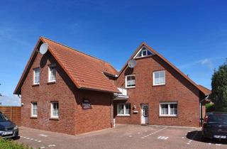 Mehrfamilienhaus kaufen in 26409 Wittmund, Ein Mehrfamilienhaus mit zusätzlichen Ferienwohnungen in Sackgassenlage mit Deichblick zu verkaufen!