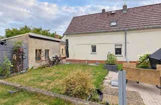 Einfamilienhaus kaufen in 06925 Groß Naundorf, Landleben mit Freiraum – Einfamilienhaus mit Kamin, Garage und vielseitigem Nebengelass