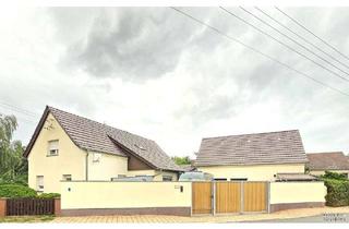 Einfamilienhaus kaufen in 06925 Groß Naundorf, Landleben mit Freiraum – Einfamilienhaus mit Kamin, Garage und vielseitigem Nebengelass