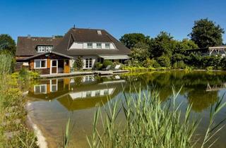 Einfamilienhaus kaufen in 24790 Rade, Großzügiges Einfamilienhaus mit Schwimmteich, Sauna und besonderem Wohnambiente