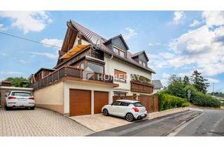 Haus kaufen in 65232 Taunusstein, Gepflegtes Dreifamilienhaus mit PV-Anlage, Doppelgarage & Eigentümerwohnung