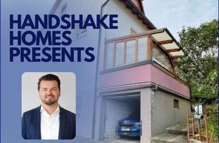 Haus kaufen in 97720 Nüdlingen, Viel Platz & Flexibilität: Gepflegtes Zweifamilienhaus in ruhiger Lage