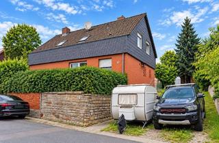 Einfamilienhaus kaufen in 38228 Lesse, Freistehendes Einfamilienhaus in Salzgitter-Lesse mit 661 m² Grundstück, Keller & Kamin zu verkaufen