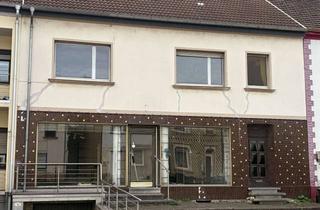 Haus kaufen in 66773 Schwalbach, Wohn- und Geschäftshaus in Schwalbach-Hülzweiler – vielseitiges Immobilieninvestment mit Potenzial
