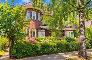 Mehrfamilienhaus kaufen in 26382 Wilhelmshaven, Solides Dreiparteienhaus mit Garten, Balkonen und zwei Garagen attraktive Kapitalanlage