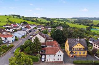 Einfamilienhaus kaufen in 35510 Butzbach, SÜD-FAUERBACHER FELDRANDLAGE! - Weitläufiges Einfamilienhaus mit 233 m² und Wintergarten