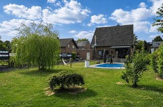 Einfamilienhaus kaufen in 41844 Wegberg, Einfamilienhaus mit großem Garten, Pool und zusätzlichem Ausbaupotenzial in Wegberg - Klinkum
