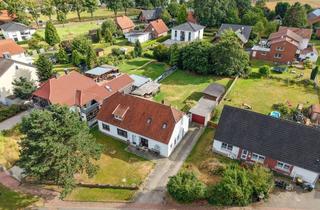 Haus kaufen in 32479 Hille, Familienfreundliches Zweifamilienhaus in ruhiger Lage mit weitläufigem Garten